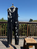 Black sleeveless denim jumpsuit with lace and Barong Tagalog accents